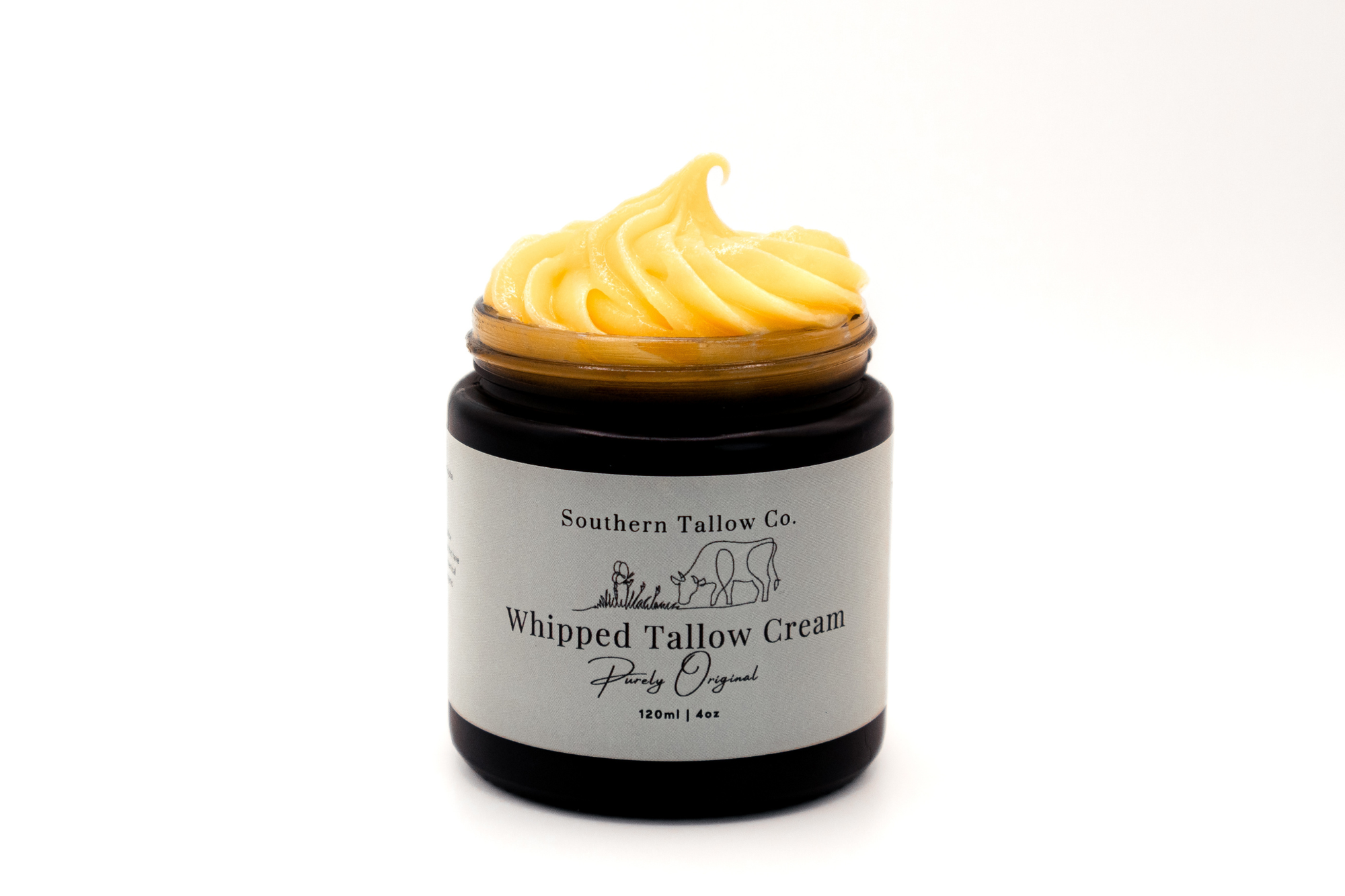 Jar of Whipped Tallow Cream with a white label on a white background